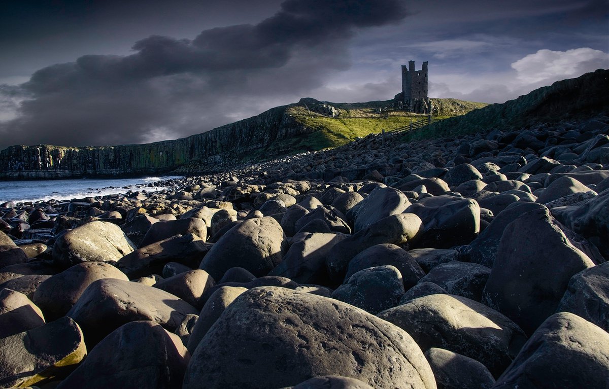 beach boulders in Northumberland by DAVID SLADE