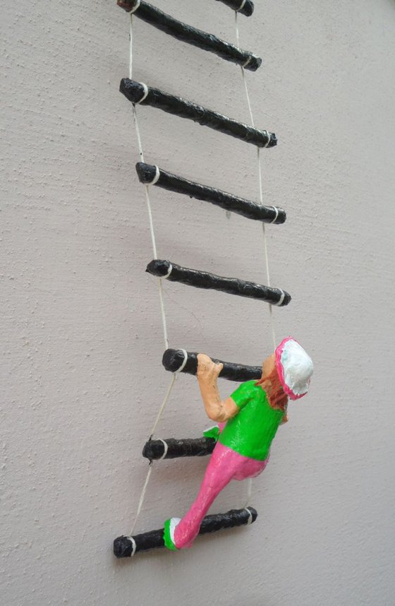 Girl on a ladder