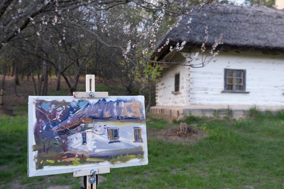 Old Ukrainian hut. Spring
