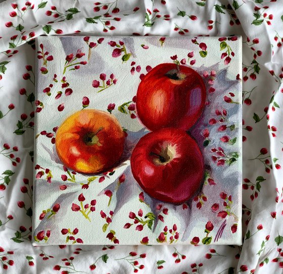 Apples on a floral background
