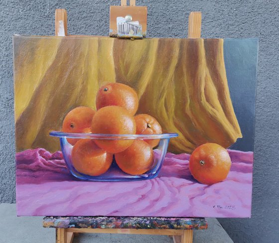 Oranges in a glass bowl