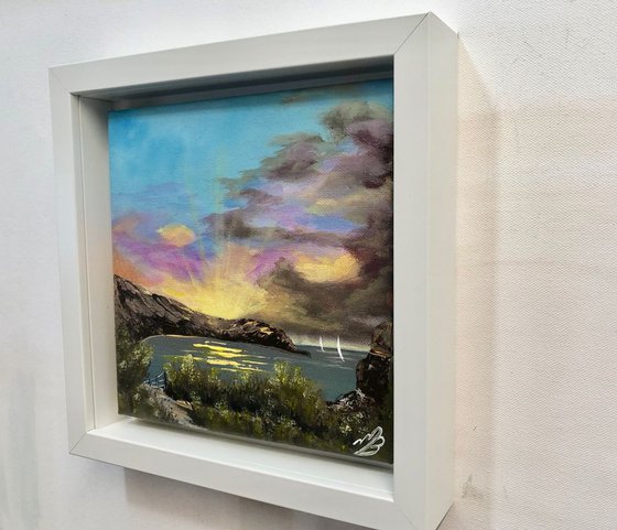 Sunrise over Lulworth Cove in a frame