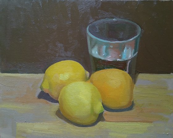 Three Lemons and a Glass