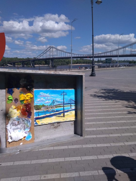 Sunny day and footbridge. pleinair painting