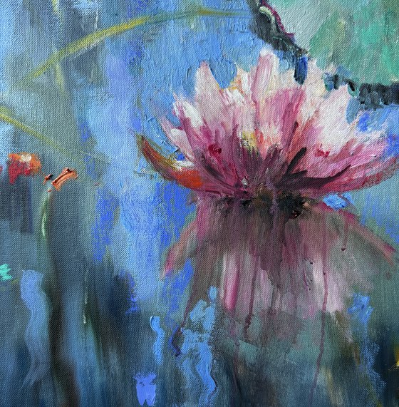 Water lilies on blue water