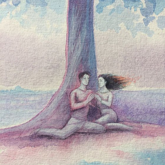 Lovers and tree on a summer evening