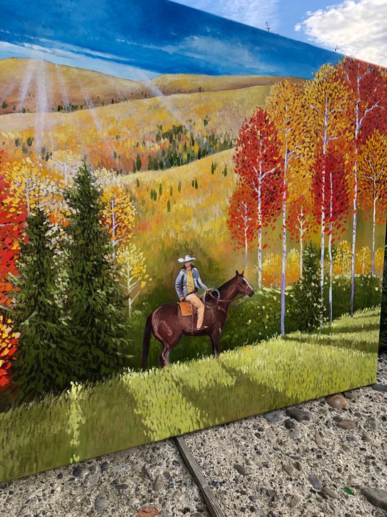 Cowboy in autumn forest