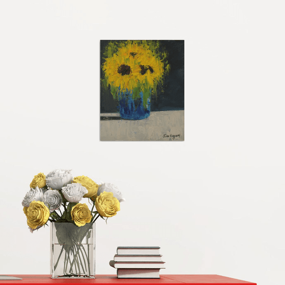Sunflowers in blue vase