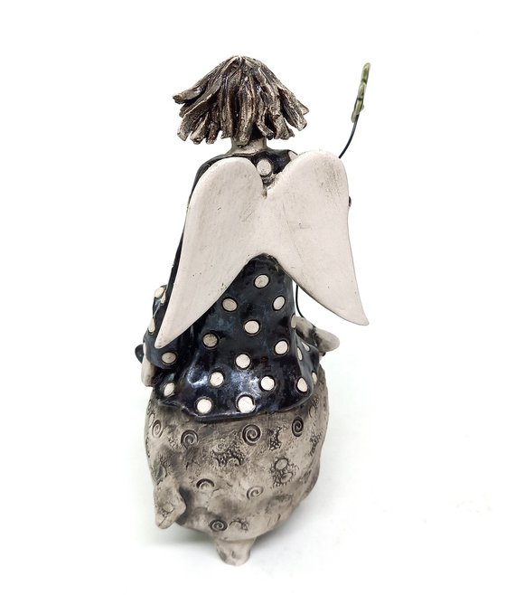 Whimsical Angel on Sheep