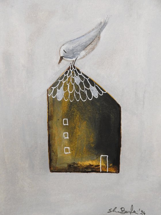 The tiny house and the bird