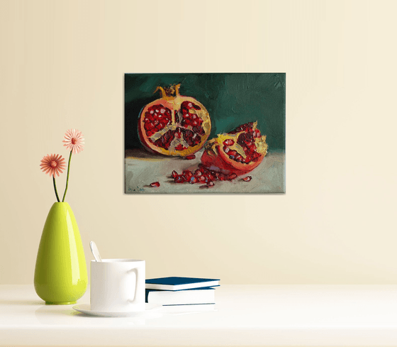 Pomegranate on blue