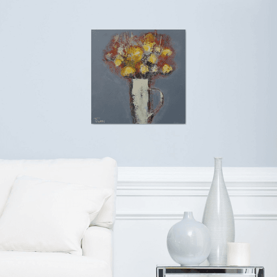 Flowers in a white jug.