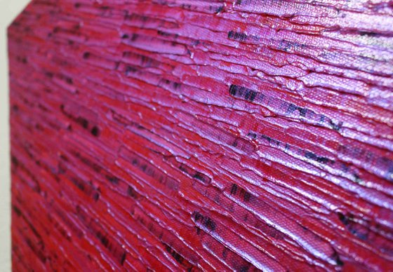 Iridescent pink red knife texture