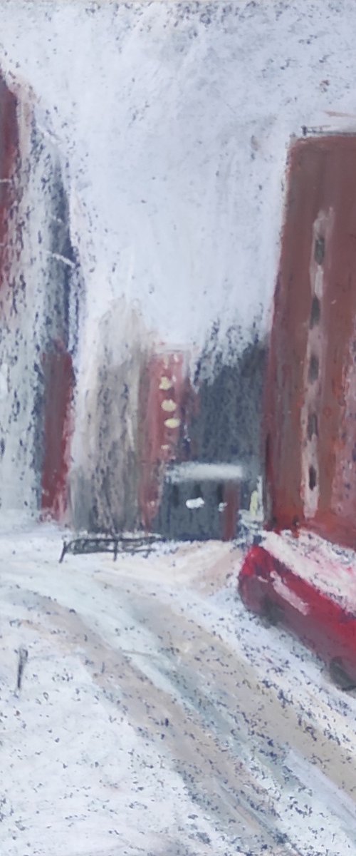 Red car and red houses. It`s snowing. Snow landscape by Natasha Voronchikhina