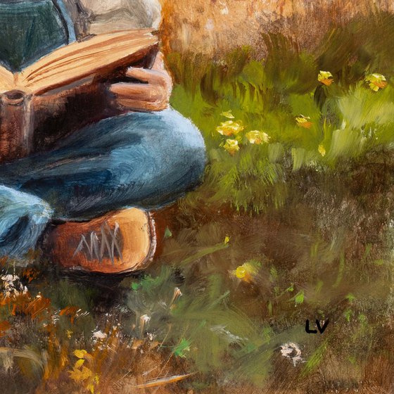 Farmer boy reading a book