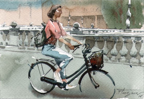 Bicycler with white shoes