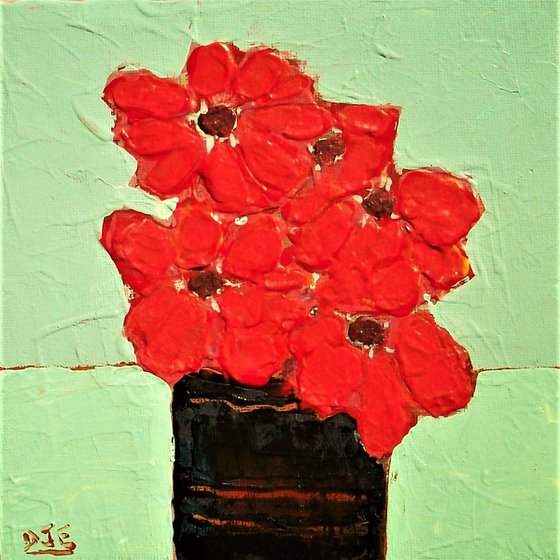 Red Anemones in a Black Vase