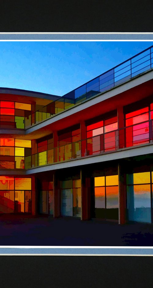 Modernist building illuminated at sunset by Robin Clarke