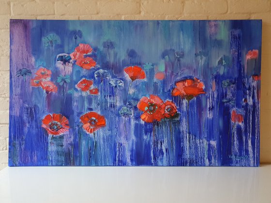 Poppies on blue