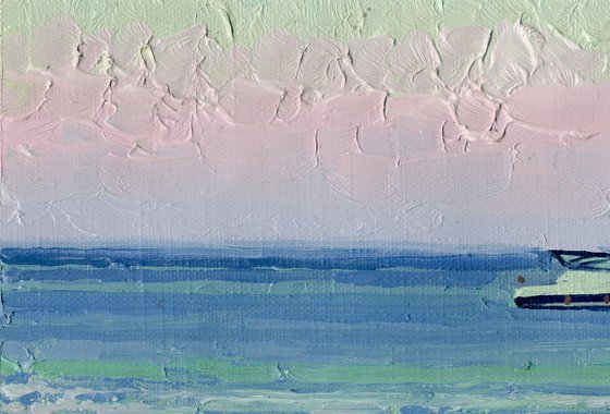 Sunset. Boats on the sea