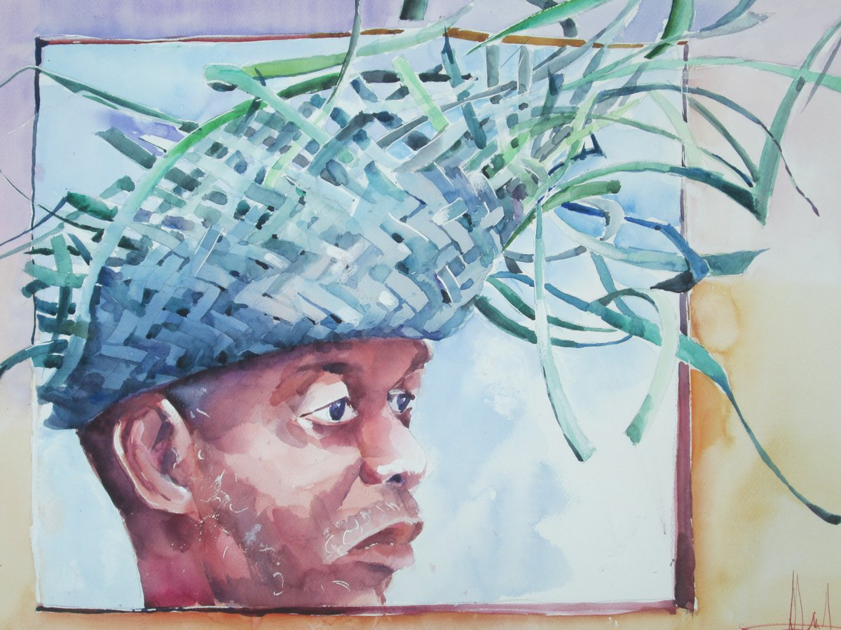 Man with green hat by RADU DUMITRESCU