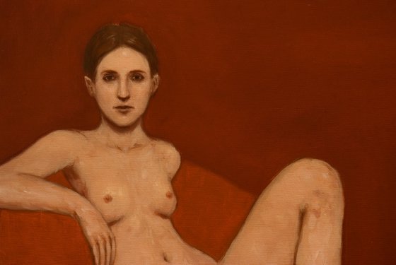 woman on a red sofa