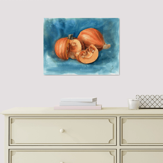 Still life with pumpkins on a blue background