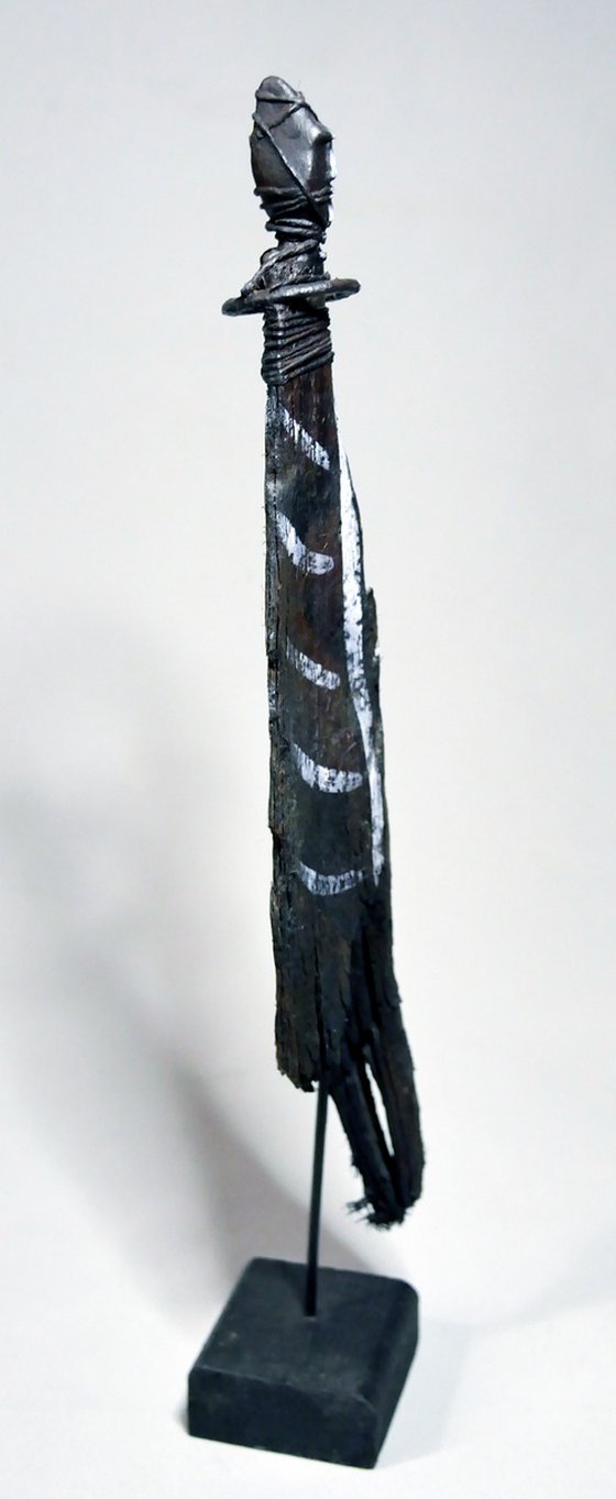 Votive statue, Totem