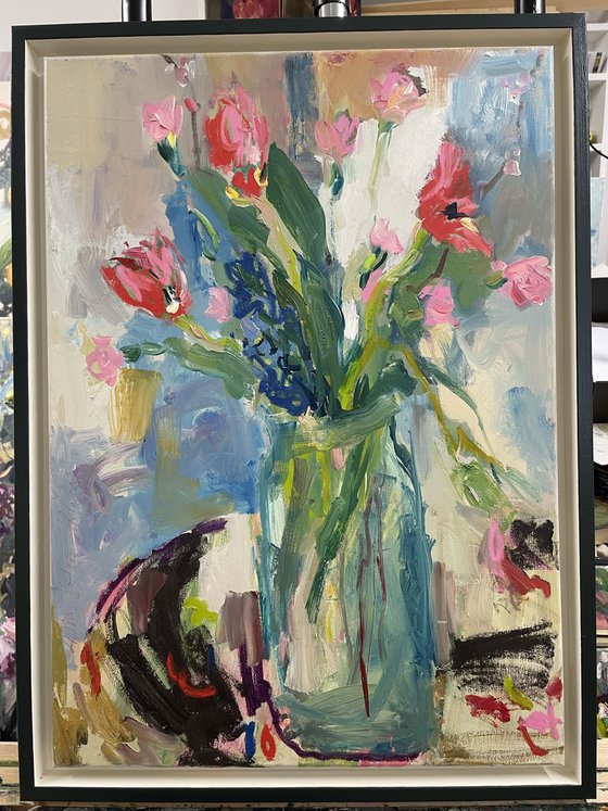 Spring flowers in a glass vase