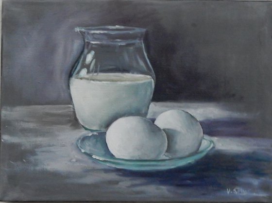 Eggs and milk jug.