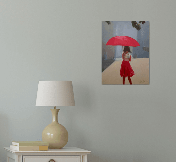Girl with a red umbrella
