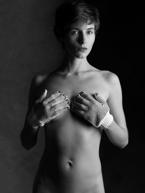Portrait of Young Woman with Strange Gloves