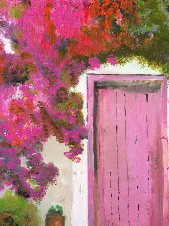 Mediterranean House with Pink Flowers