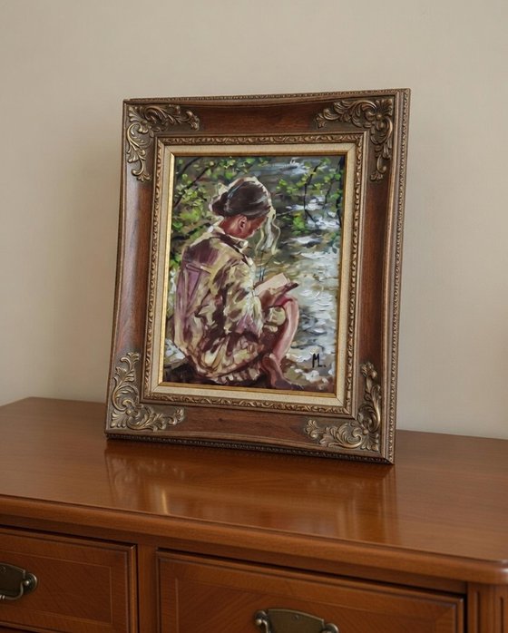 " WAITING FOR SPRING WITH BOOK ON LAKE "