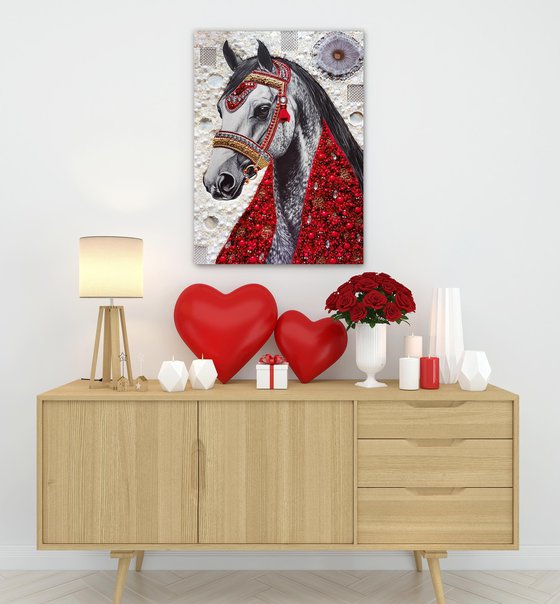 White horse in a red scarf