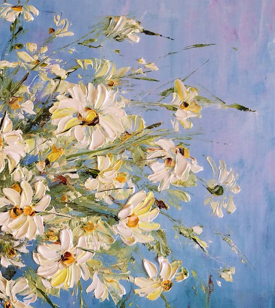 GREETINGS FROM SUMMER - Daisies. Chamomile Bouquet. Flowers. Spring. Wind. Blue background. Wildflowers.