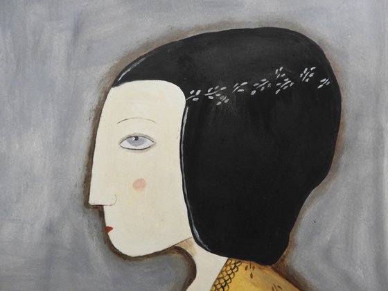 The woman in profile with black hair
