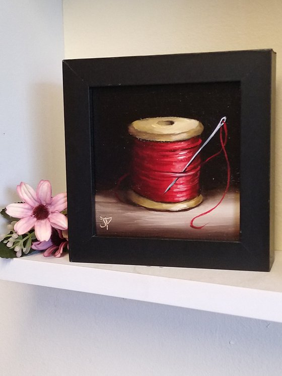 Little Red needle and thread still life