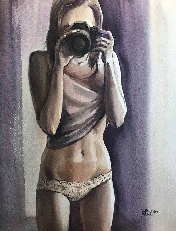 Girl with a camera. Female monochrome portrait.