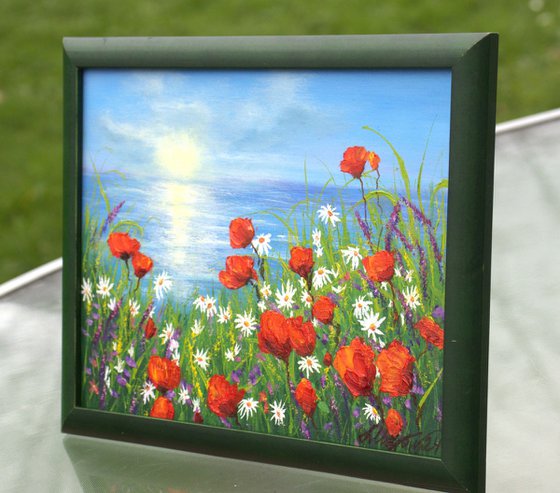 Seascape and poppy field