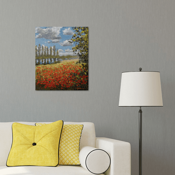 Poppy field by the river