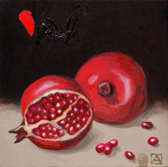Two pomegranate fruits
