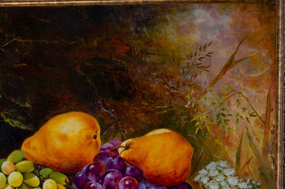 Still life with pears and grapes on an old tree stump