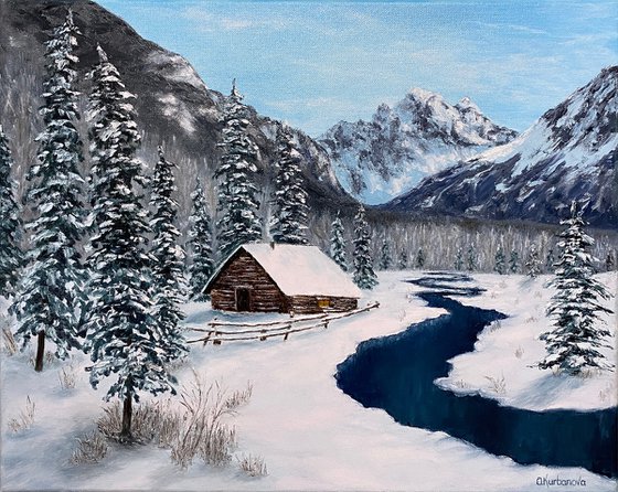 Cabin in wintry mountains