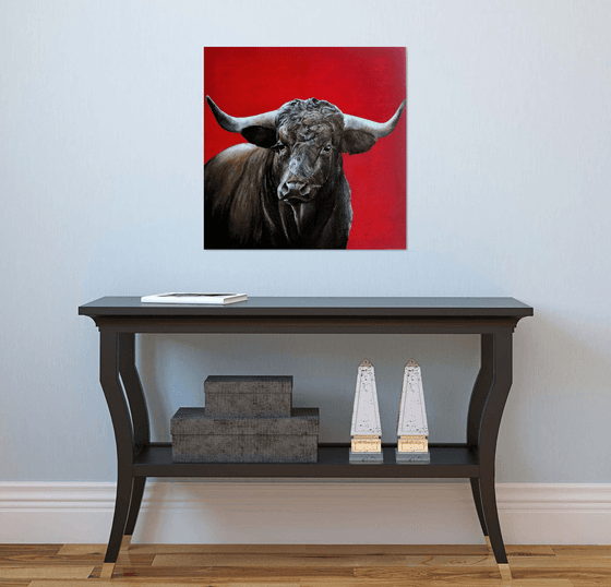 Brave bull on red