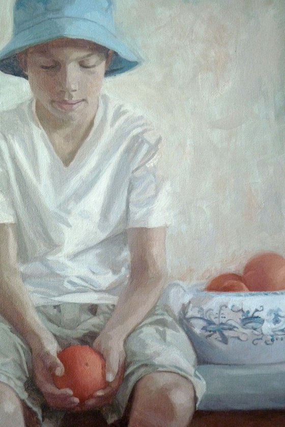 Boy with oranges