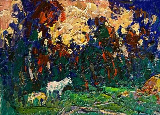 Yellow sunset behind tree