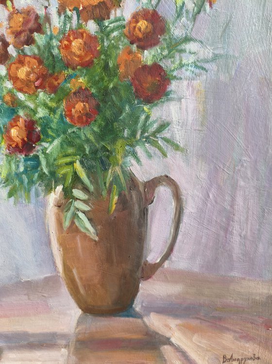 Marigolds in a clay pot