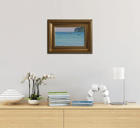 Sunset. Boats on the sea