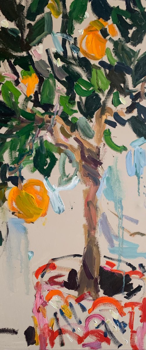 An orange tree in a pot. by Lilia Orlova-Holmes